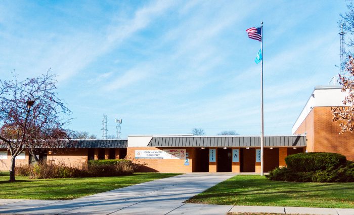 Alcott Elementary School on sunny day.
