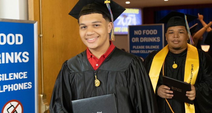 Graduates leaving the auditorium.