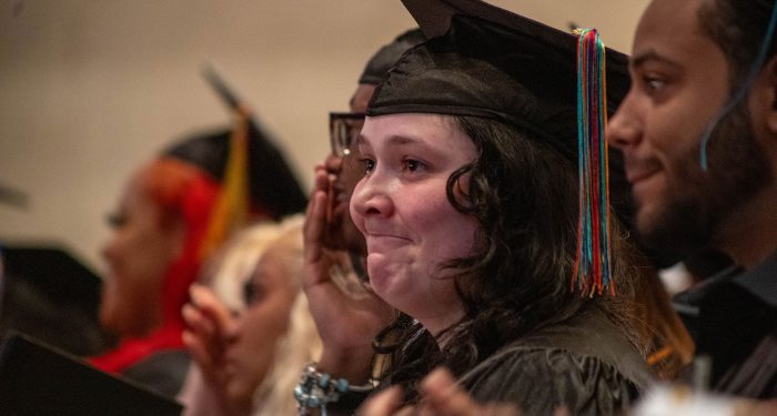Students in cap and gowns.