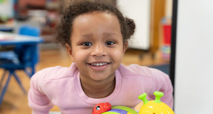 Close-up of a smiling girl.