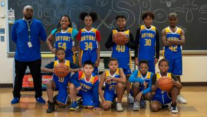 Basketball team with their coach.