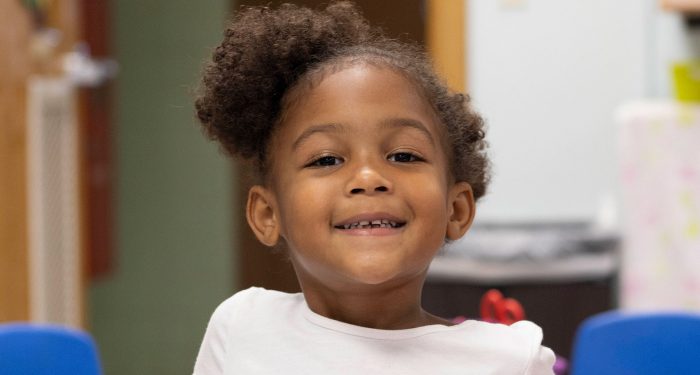 Close-up of a smiling girl.