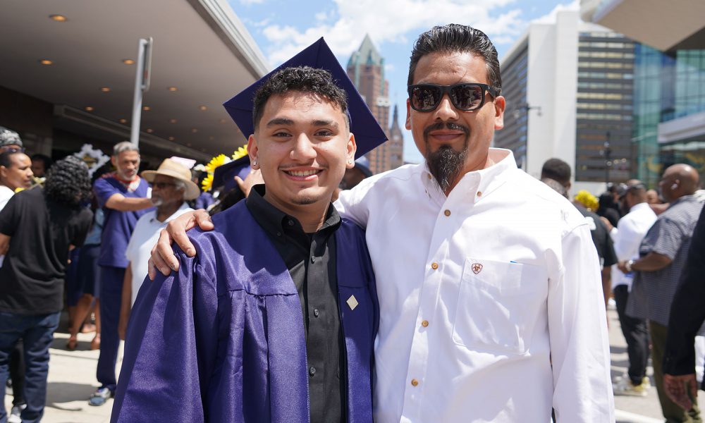 Graduates with their family after the ceremony.