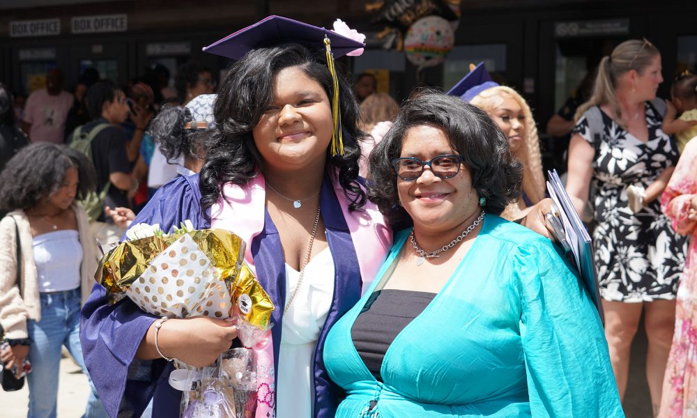 Graduates with their family after the ceremony.