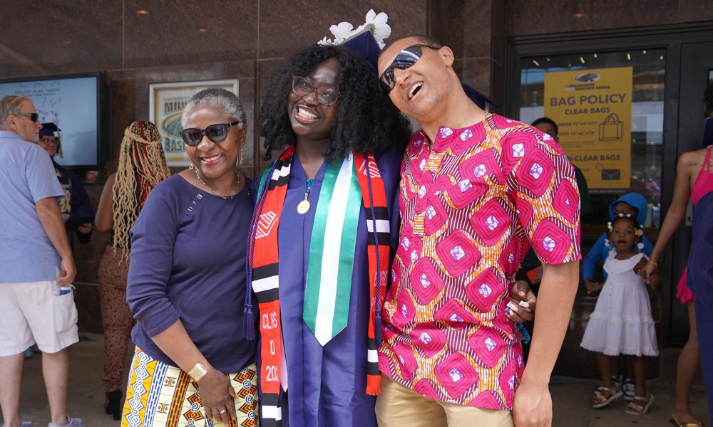 Graduates with their family after the ceremony.