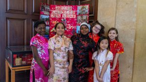 Young children in traditional Chinese clothing.