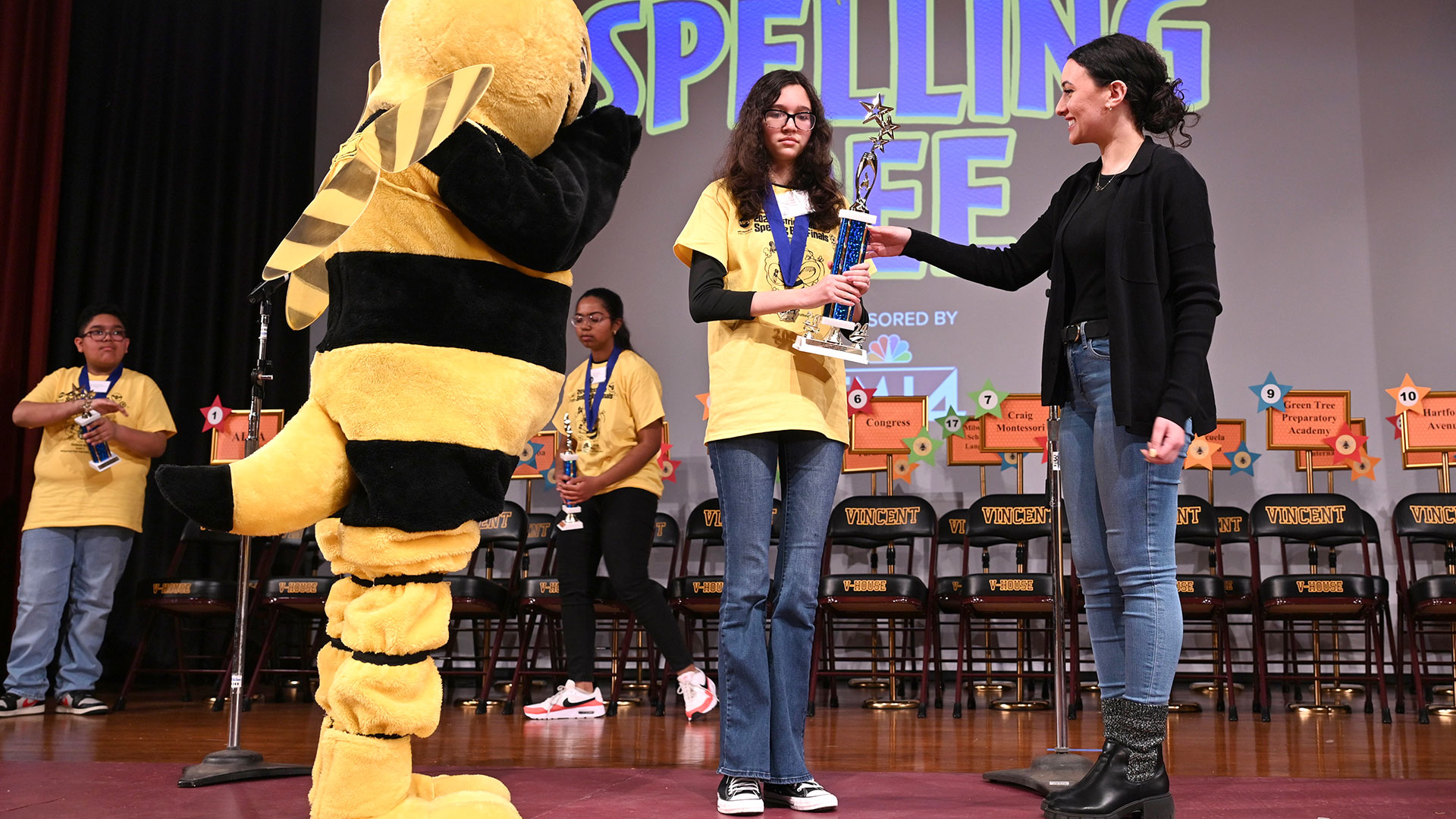 Ellen receiving her trophy.