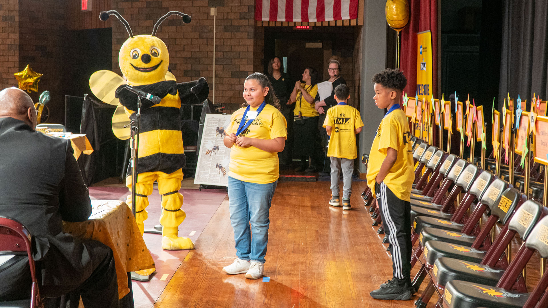Children on stage at the spelling bee.
