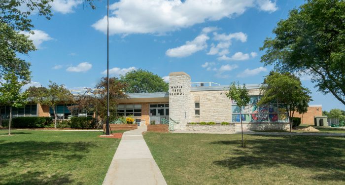 The front of Maple Tree Elementary School on a sunny day.