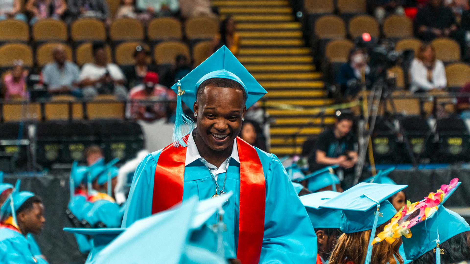 A laughing graduate.