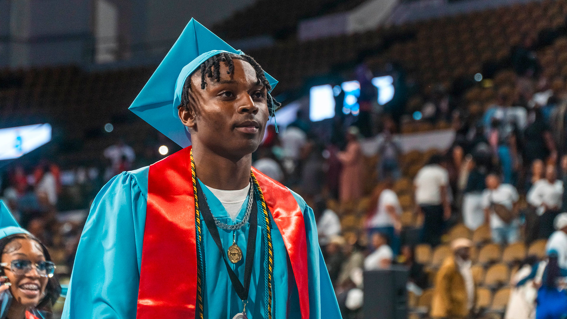 Graduates walking out of the ceremony.