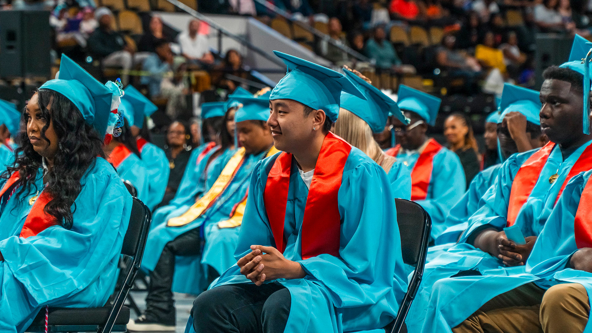 Graduates sit during the ceremony.