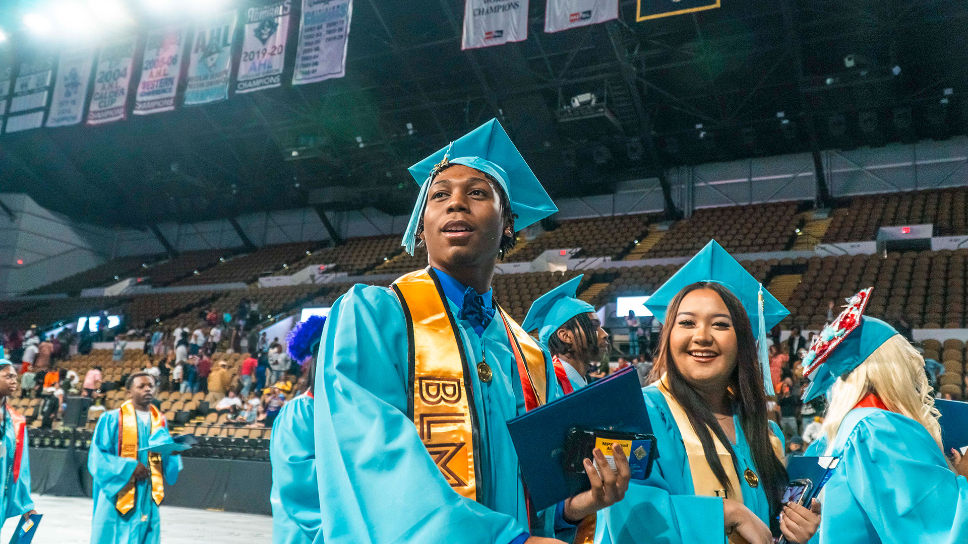 Graduates walking out of the ceremony.