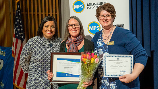 Claudia Heller de Messer the wins Teacher of the Year award.