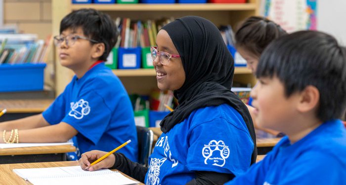 Students sitting at desks.