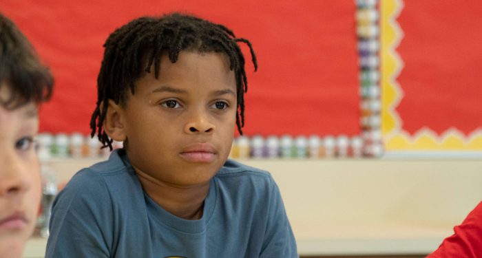 A serious looking boy.