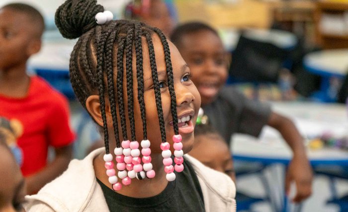 Close-up of a smiling girl.