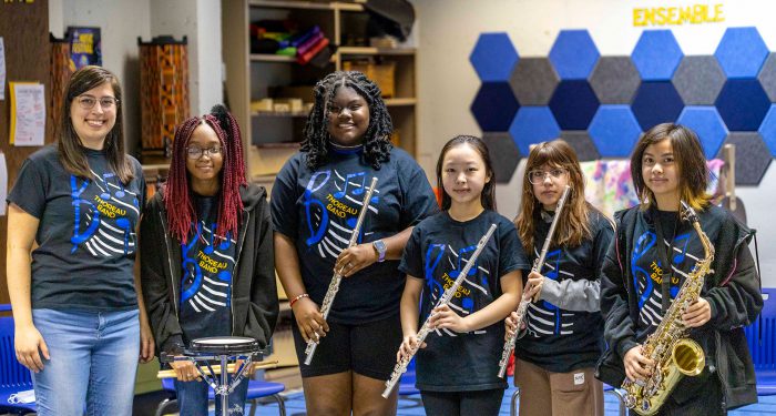 Members of Thoreau School ensemble pose with their instruments.