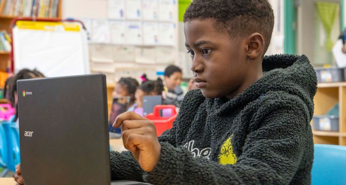 A child using a computer.