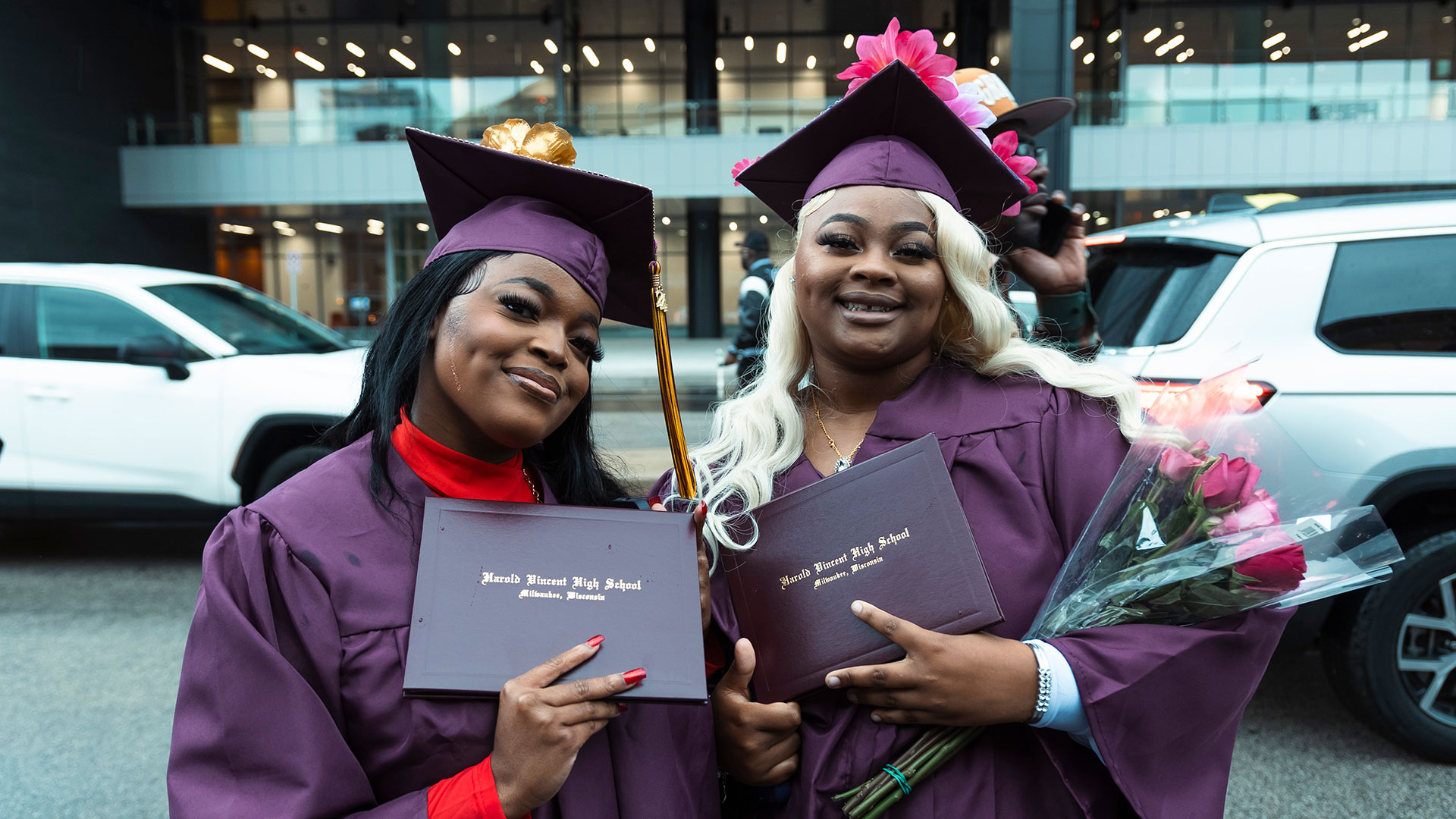 Graduates celebrate outside after the ceremony.