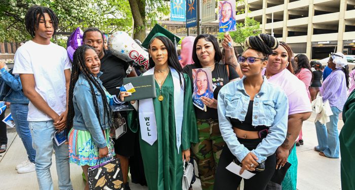 Graduates with their families outside after the ceremony.