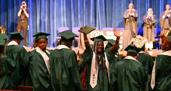 Graduates celebrating.