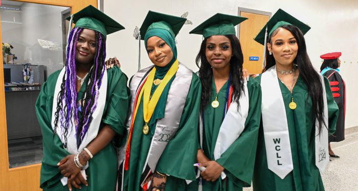 Graduates waiting in the hall before the ceremony.