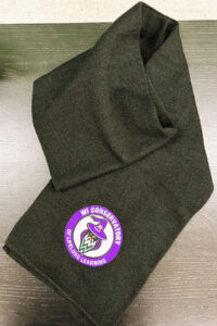 A scarf with the WCLL logo