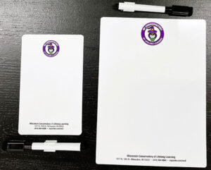 Two whiteboards on a table.