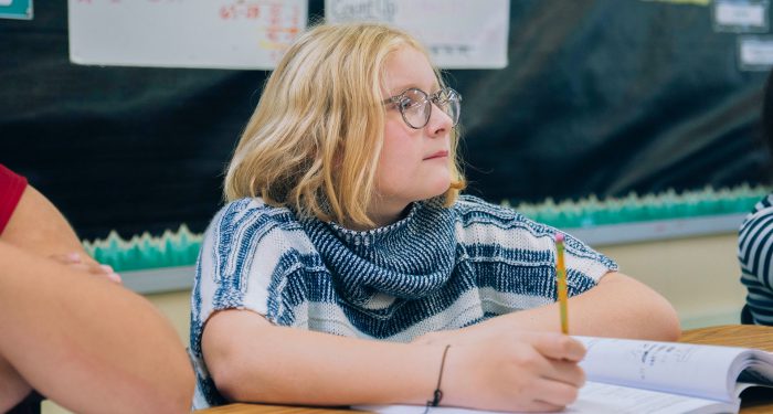 A student ready to take notes.